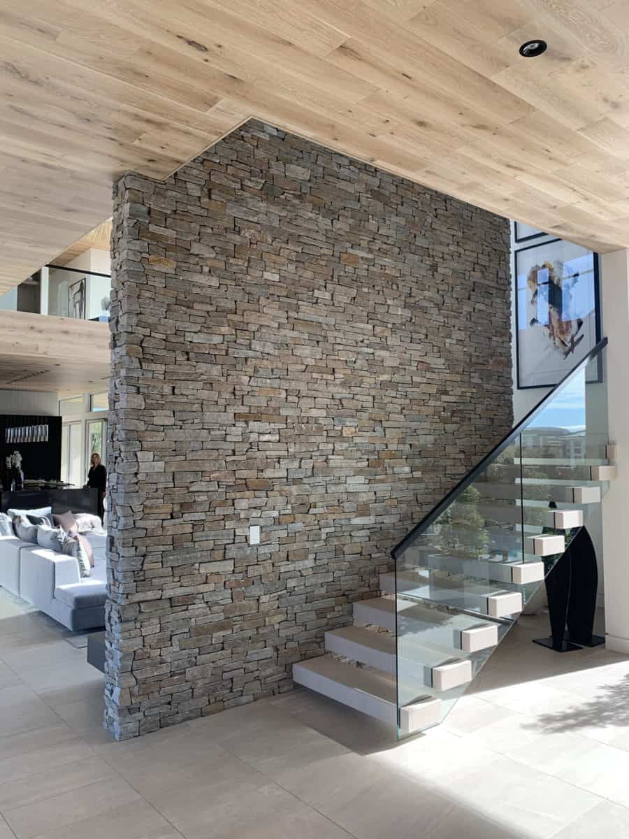 seamless natural stone veneer accent wall Chowa House