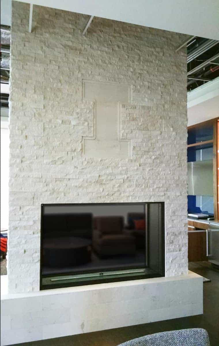 Creme Ledgestone and tile fireplace