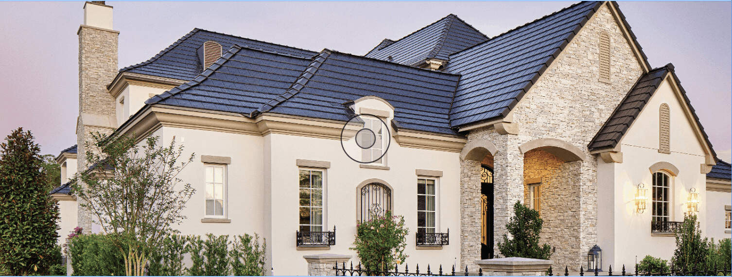 Berkshire Buff Estate natural stone panels on a mediterranean style home with stucco