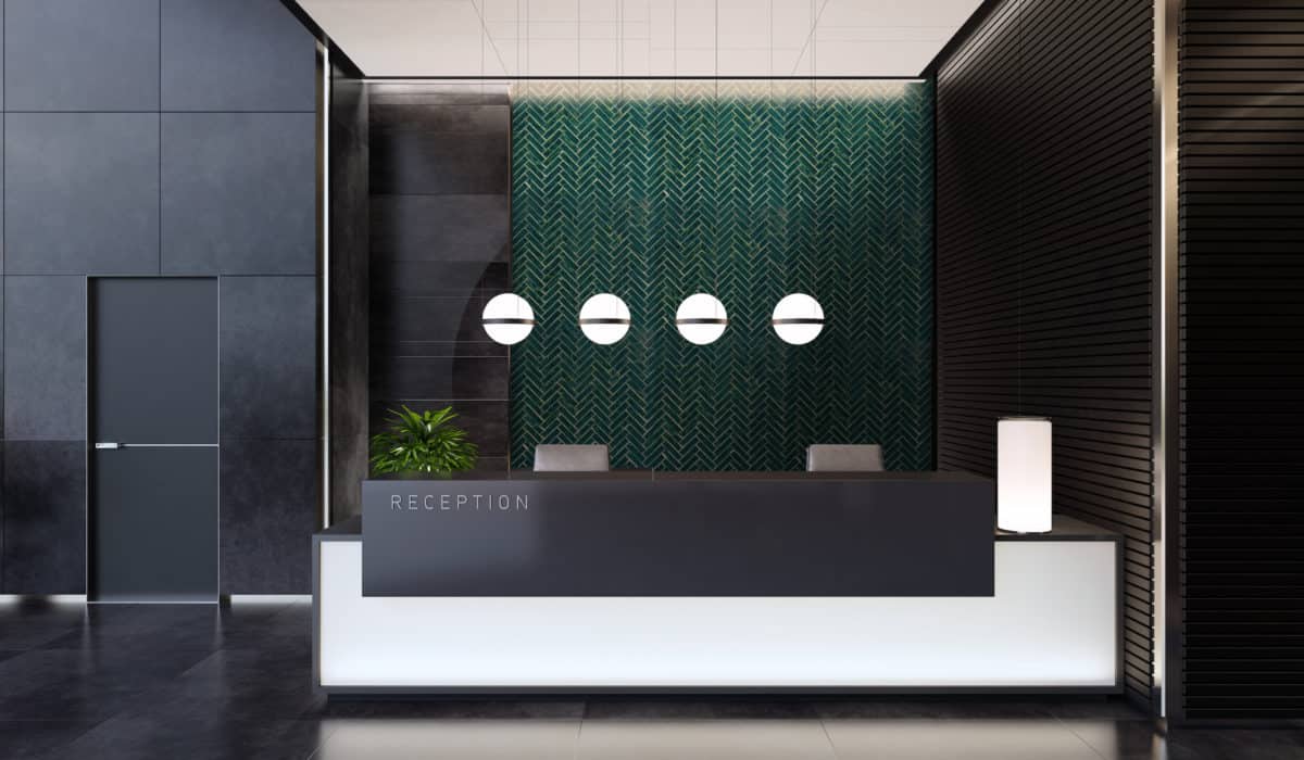 forest green tile in hotel reception area