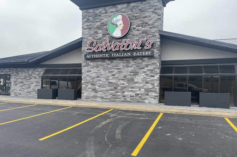 grey faux stone on restaurant exterior front stone cladding