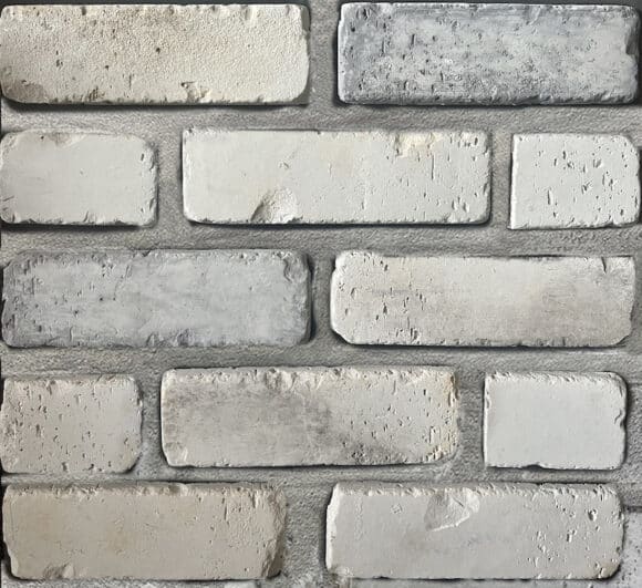 Thin brick with an antique white and grey finish