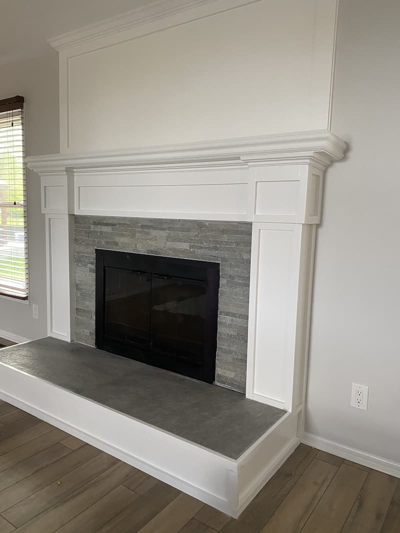 Bluestone fireplace with matching porcelain hearth