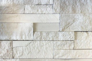 white faux stone dry stack