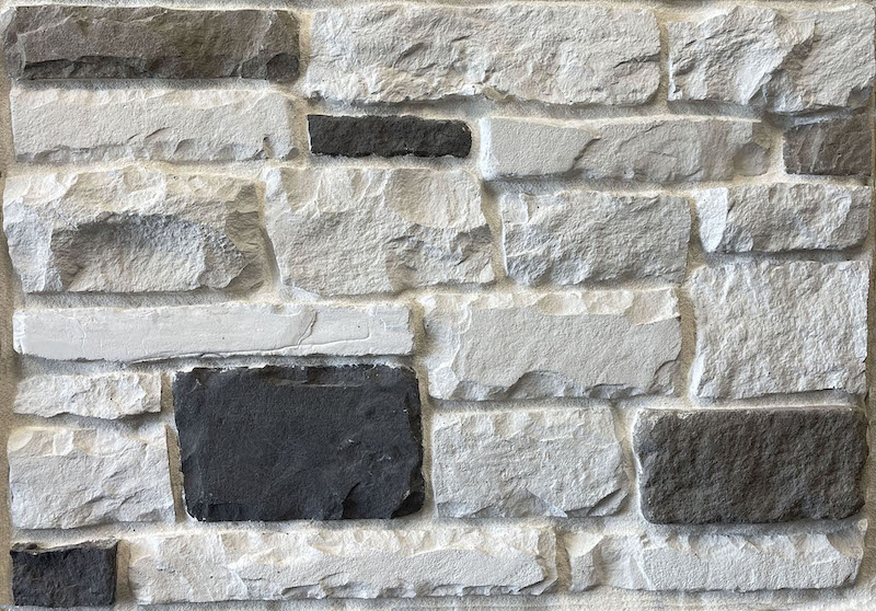 dark grey and white faux stone with chiseled edges