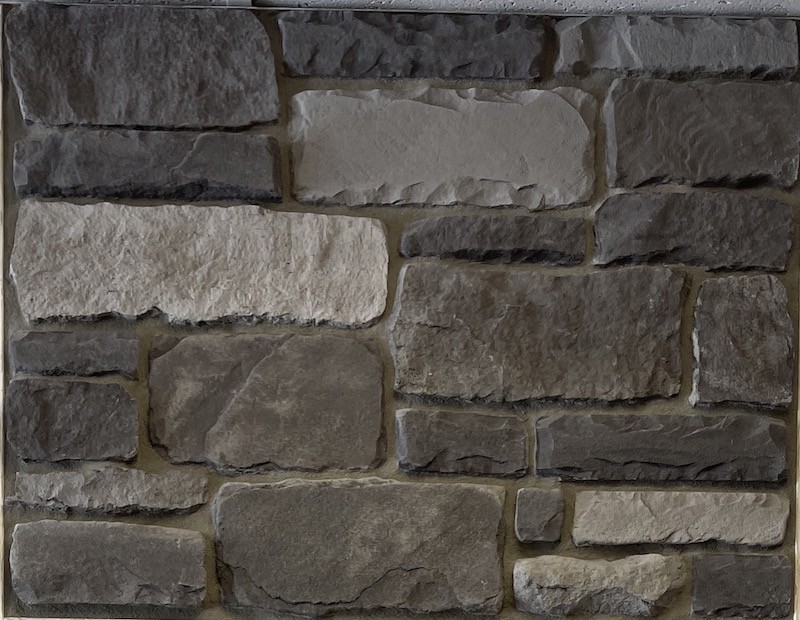 https://www.realstonesystems.com/wp-content/uploads/2023/08/Midnight-Run-Chiseled-Edge-faux-stone-Realstone-W.jpg