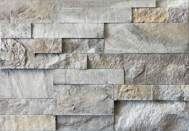 beige faux stone with cut edges and warm tones