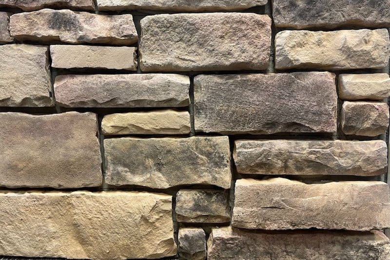 Ridgeline Chiseled Edge Faux stone W warm toned chiseled faux stone