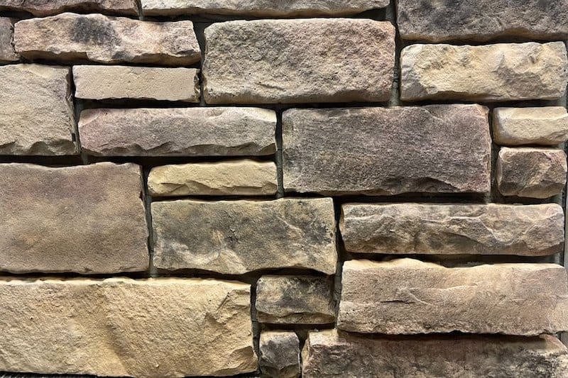 warm toned chiseled faux stone