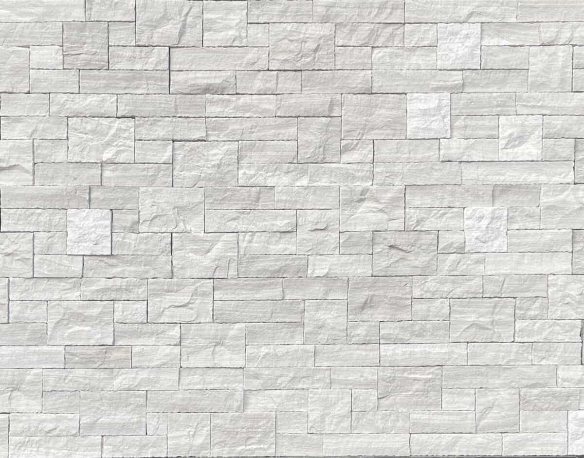 white birch estate stone swatch is a pale gray natural stone veneer limestone with the coloring of birch trees