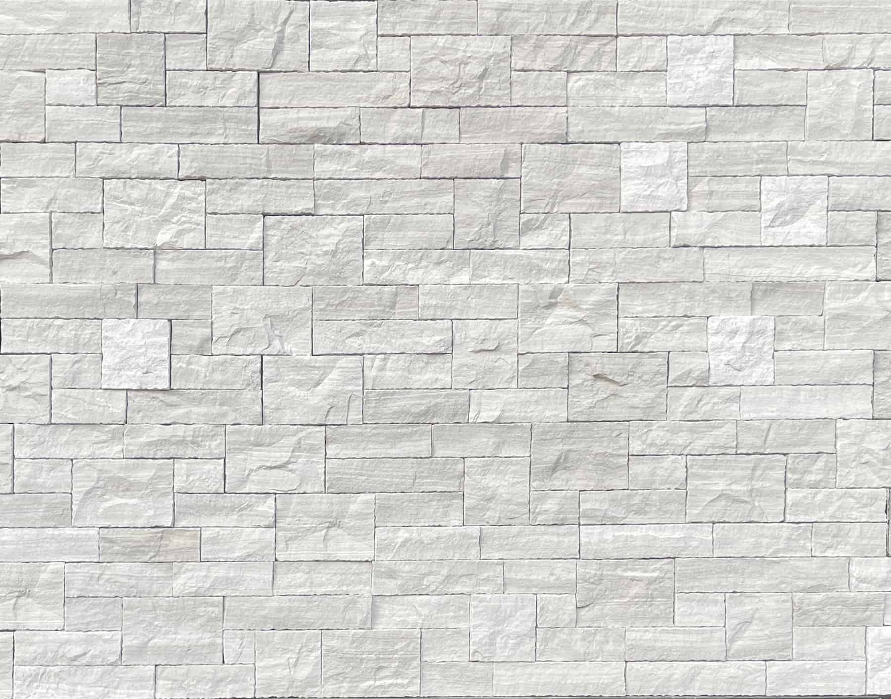 white birch estate stone swatch is a pale gray natural stone veneer limestone with the coloring of birch trees