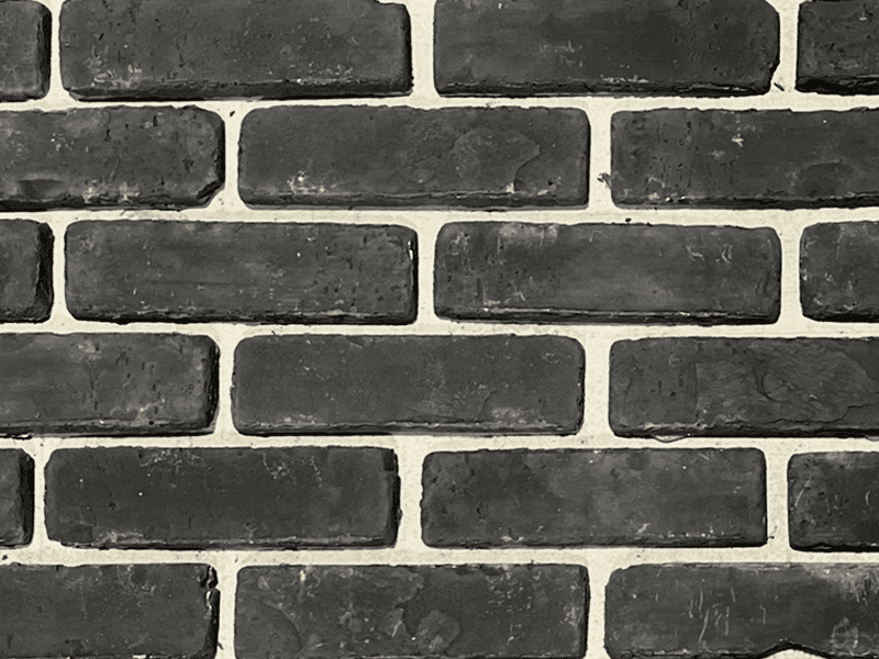 charcoal grey thin brick with white grout