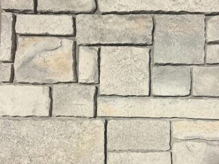 cream colored large faux stone for home exterior and interior