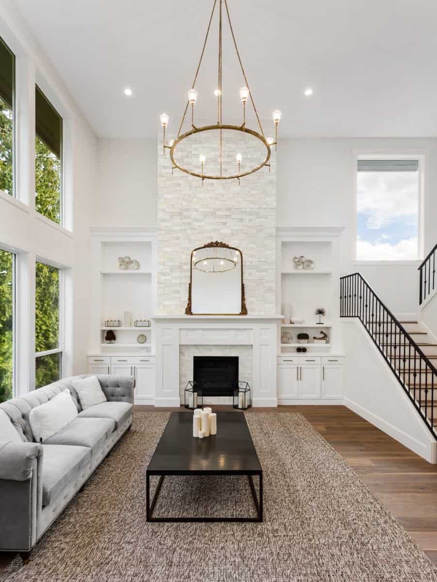 pale cream colored marble tile on an elegant fireplace