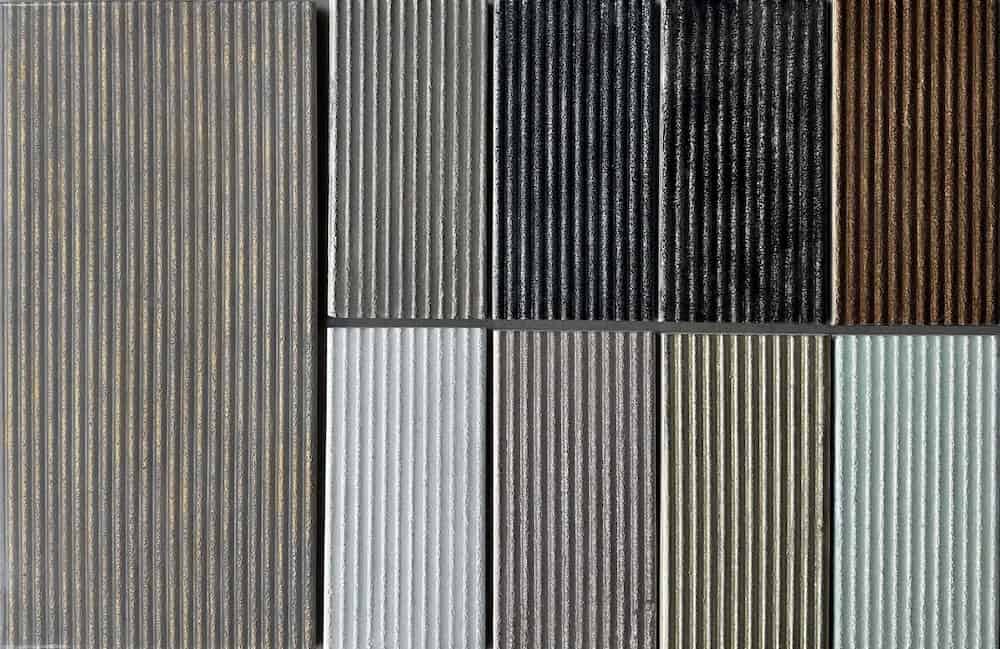 minimalist modern fluted natural stone tile in a variety of muted colors