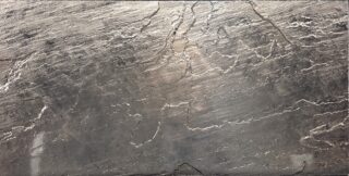 Realstone Tempered Ore large format tiles in a muted warm metallic tone with fantastic natural stone cleft