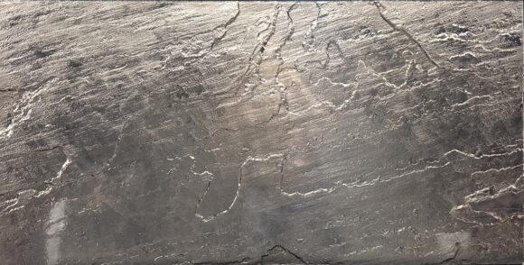 Realstone Tempered Ore large format tiles in a muted warm metallic tone with fantastic natural stone cleft