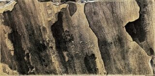 Realstone Tempered Pyrite large format tiles in a dark black and gold with fantastic natural stone cleft