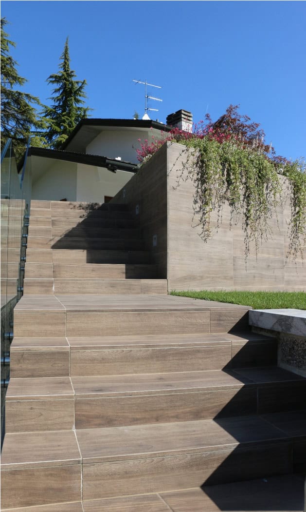 Birch looking porcelain that is designed to look like classic wood while offering the properties of porcelain, for an outdoor terrace area and walkway