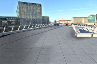 Granite looking, grey speckled outdoor porcelain pavers set up for a rooftop patio and walkway