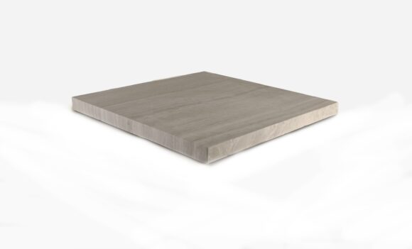 warm greige honed fireplace hearth with natural cleft front edge