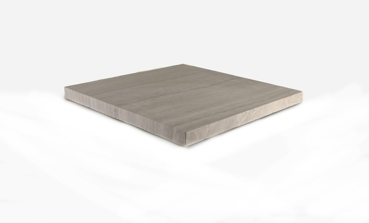 warm greige honed fireplace hearth with natural cleft front edge