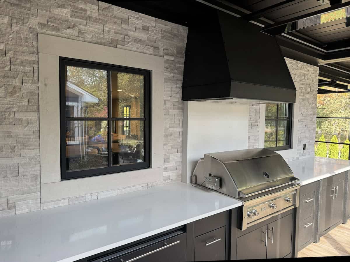 stone veneer panels exterior walls on outdoor kitchen and patio design