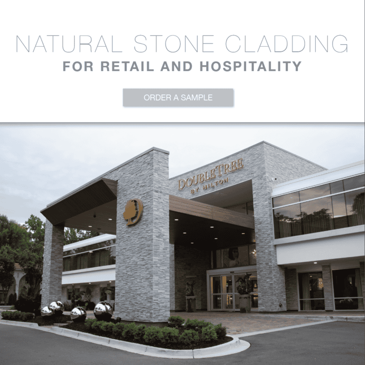 retail storefront with stacked stone facade and panelized stone veneer commercial cladding system