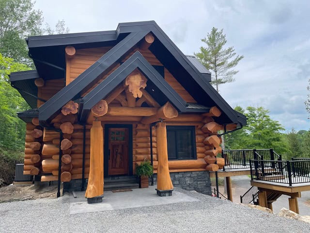 black stone on the footer of a log home