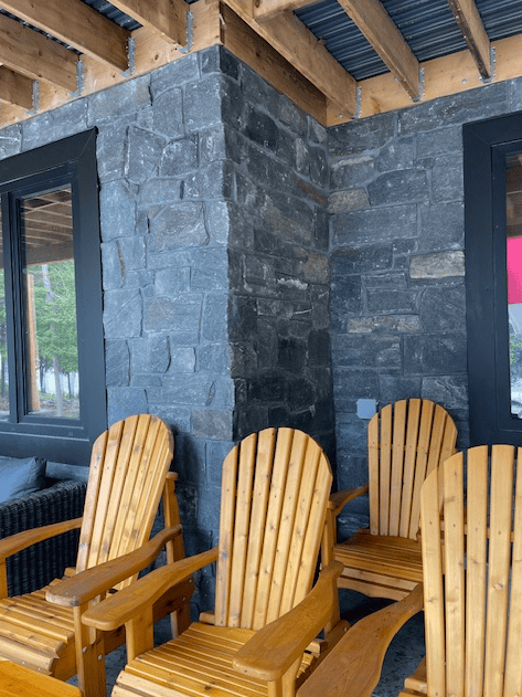 black natural stone on covered porch