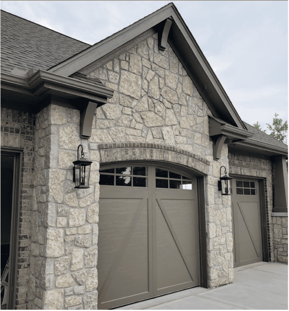 warm toned natural stone on garage exterior